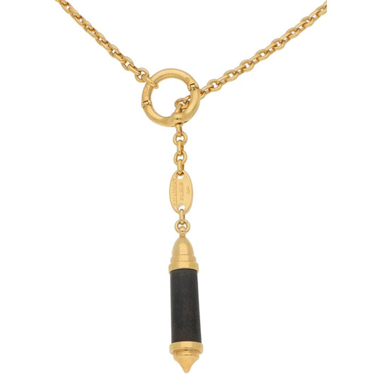 Chaumet necklace in yellow gold with snakewood pendant.