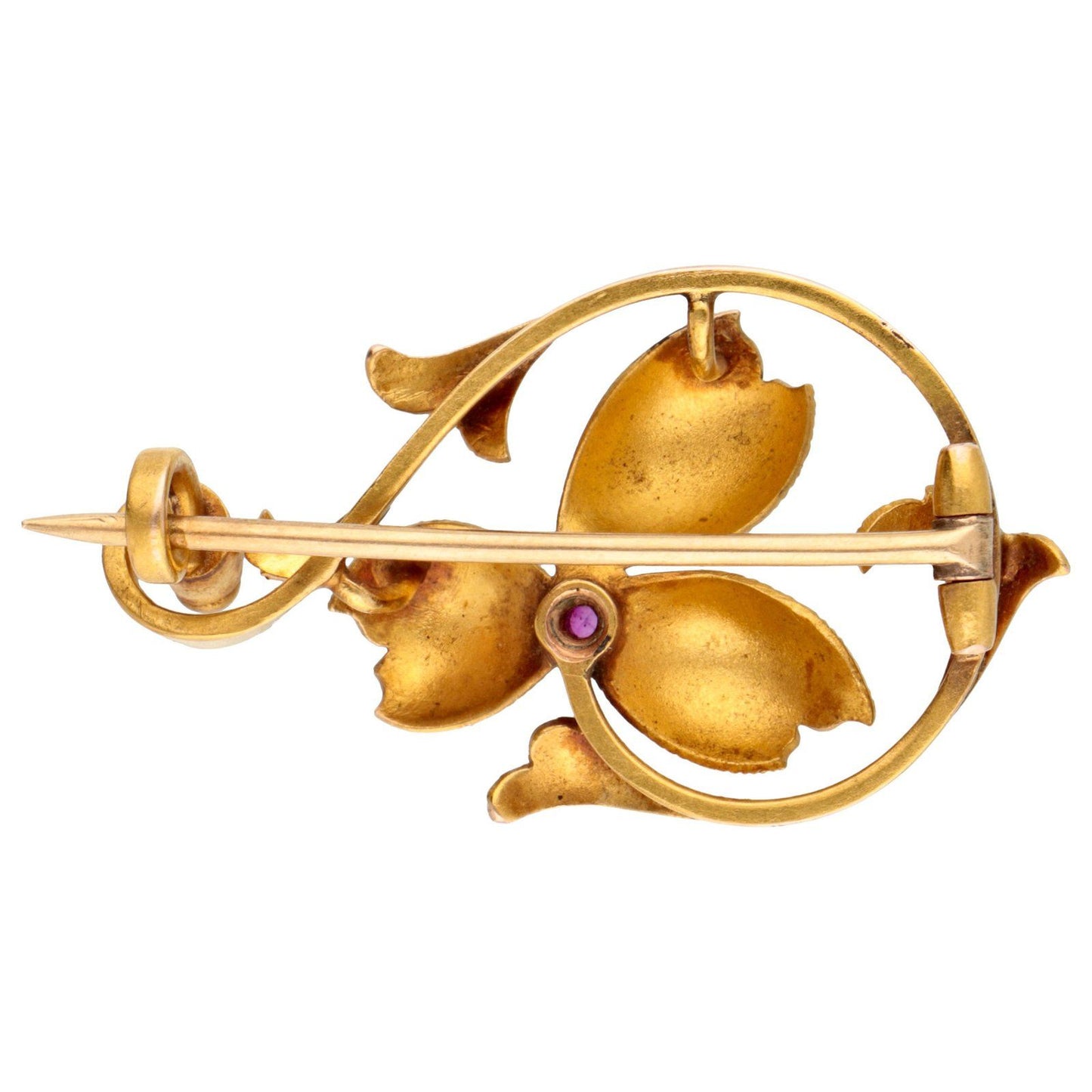 A yellow gold flower brooch with a pink sapphire centre