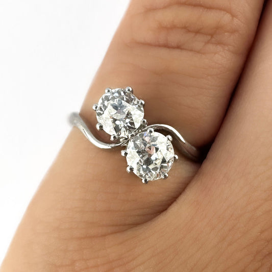 Edwardian Antique Two Stone Crossover Toi et Moi Engagement Ring in Platinum