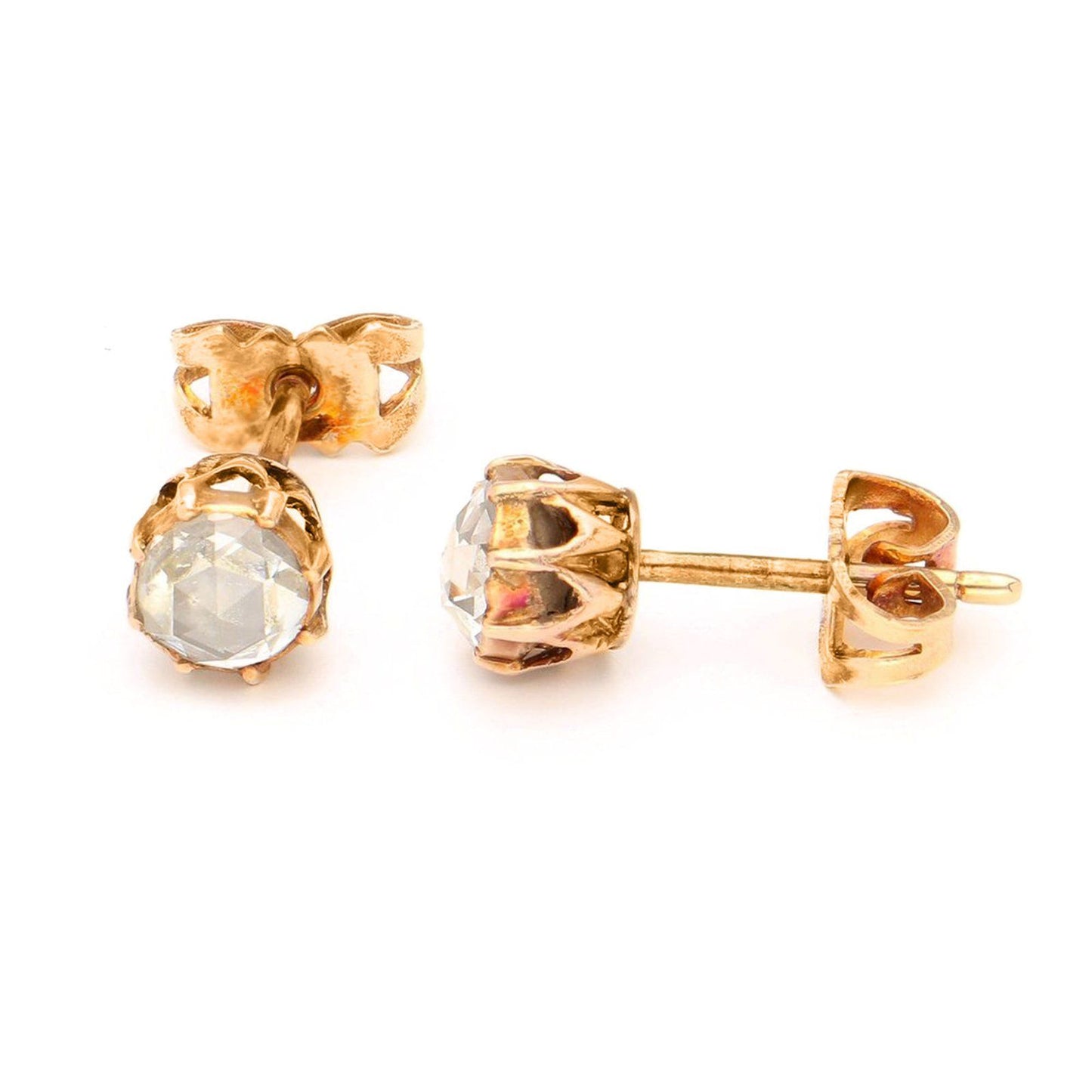 A yellow gold pair of solitaire rose cut diamond stud earrings