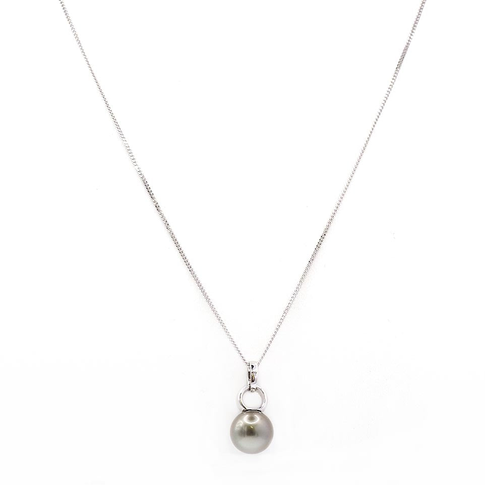 A white gold chain necklace with grey pearl and diamond pendant