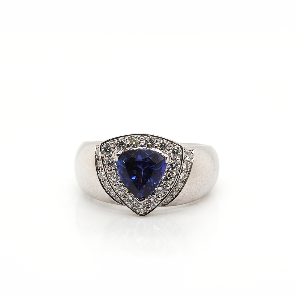 A tanzanite and diamond wide band dress ring in white gold