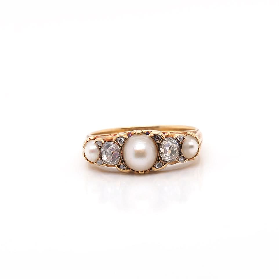 A yellow gold pearl and old cut diamond ring