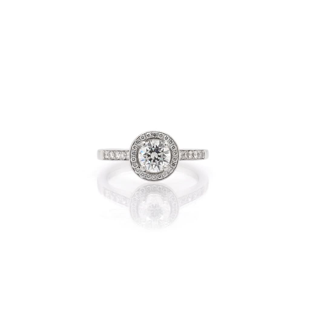 Jewellery A Platinum Diamond Halo-Set Engagement Ring