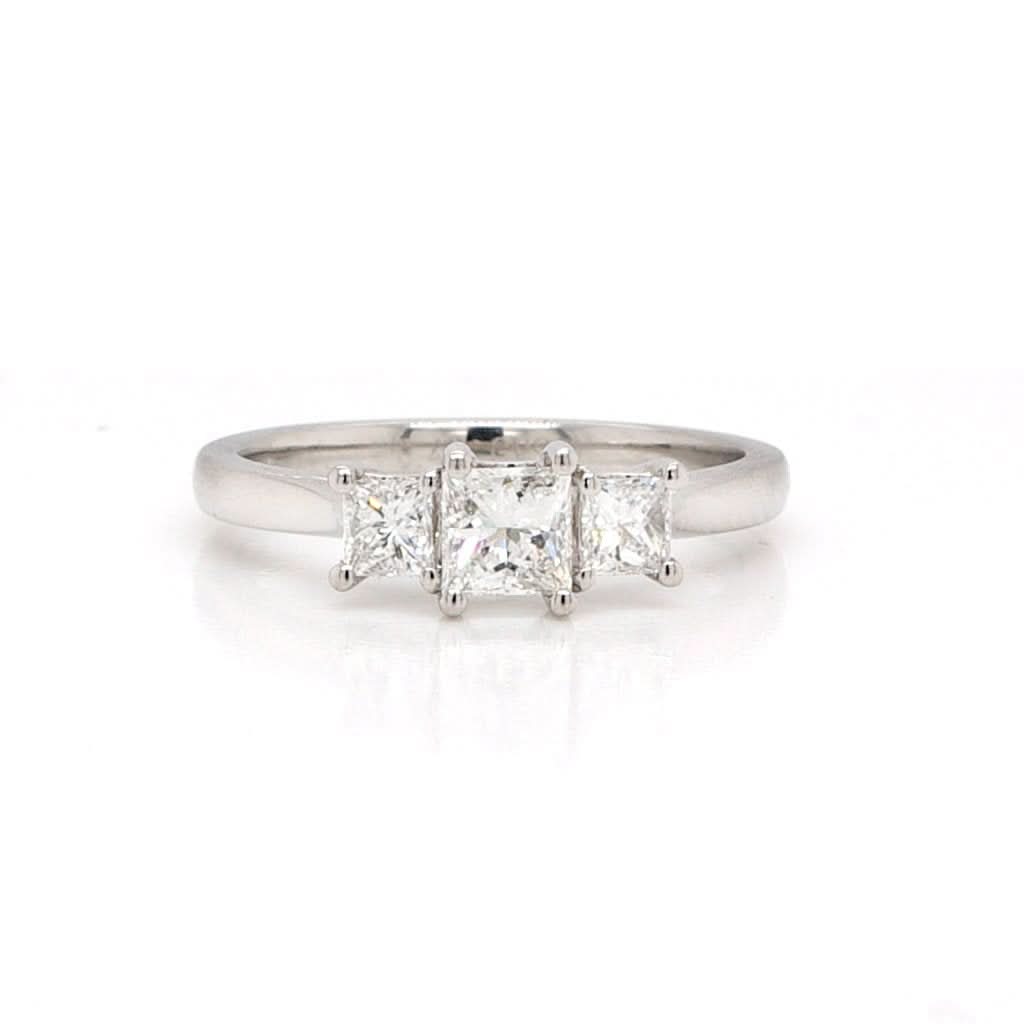 Jewellery A platinum, princess cut, three stone, diamond ring 0.40cts