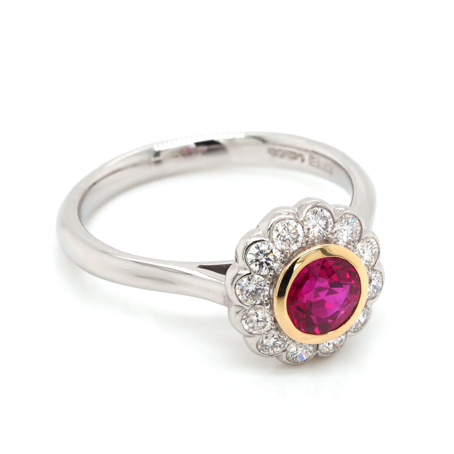 Jewellery An 18ct White and Yellow Gold Ruby Cluster Ring