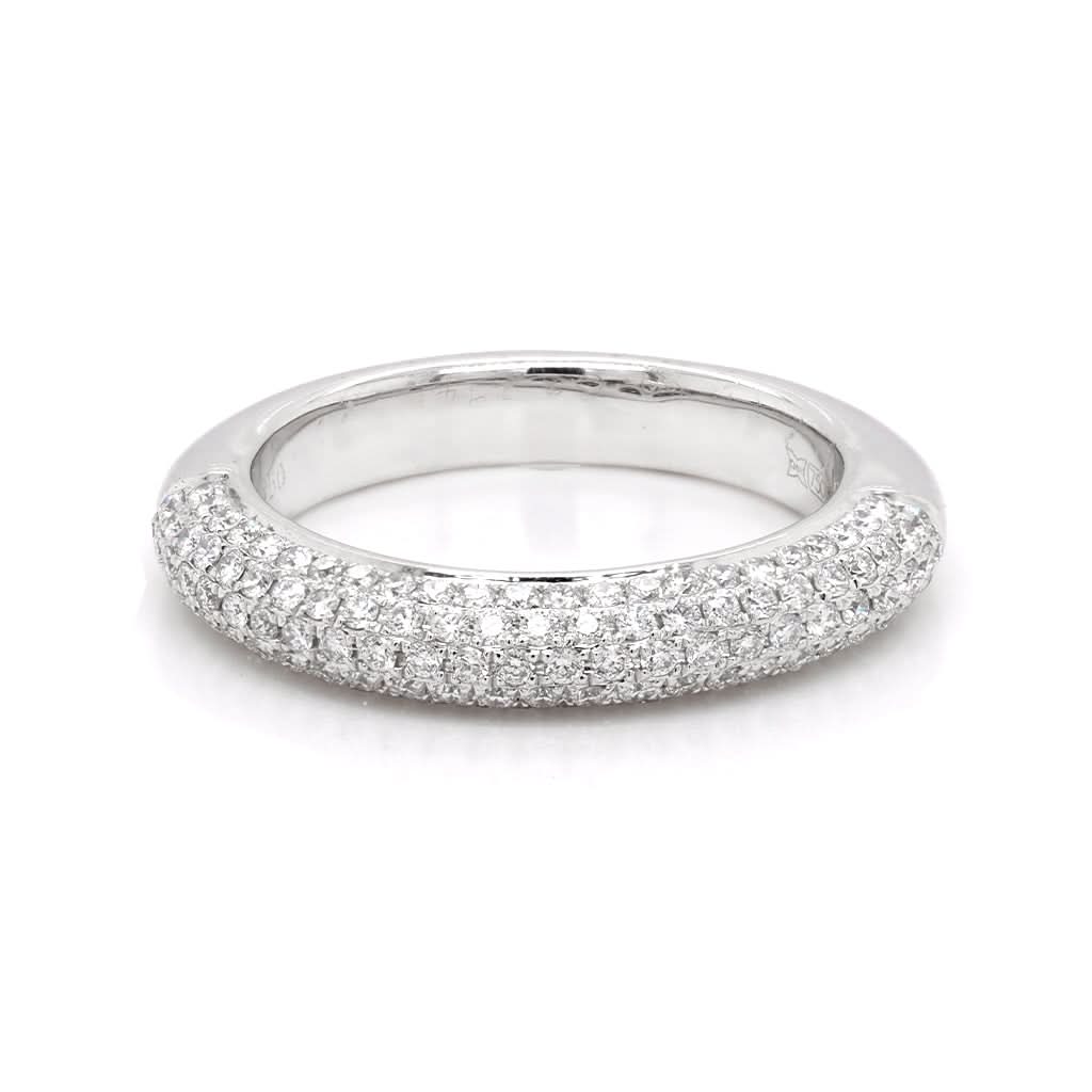 of Harrogate Jewellery An 18ct white gold and pavé-set diamond eternity ring