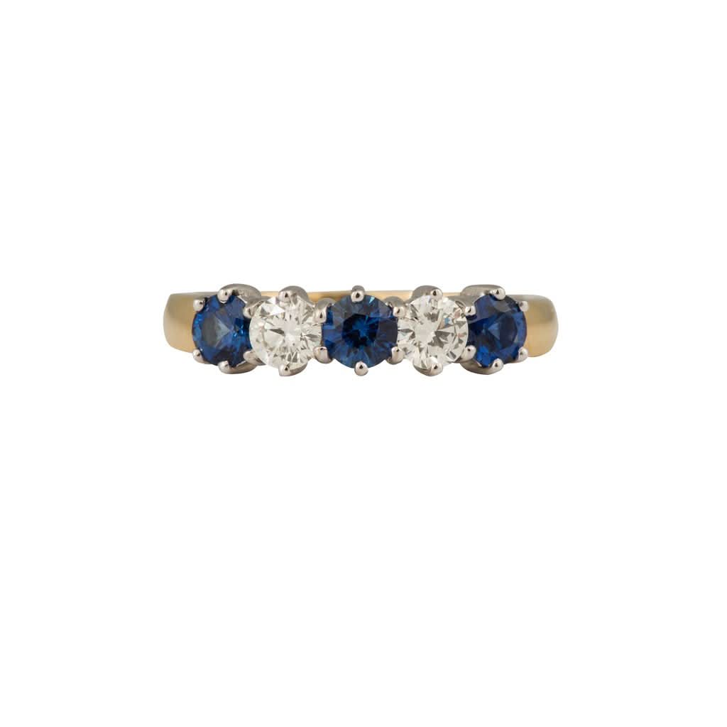 Jewellery An 18ct yellow and white gold, round sapphire and diamond, half eternity ring 1.20cts