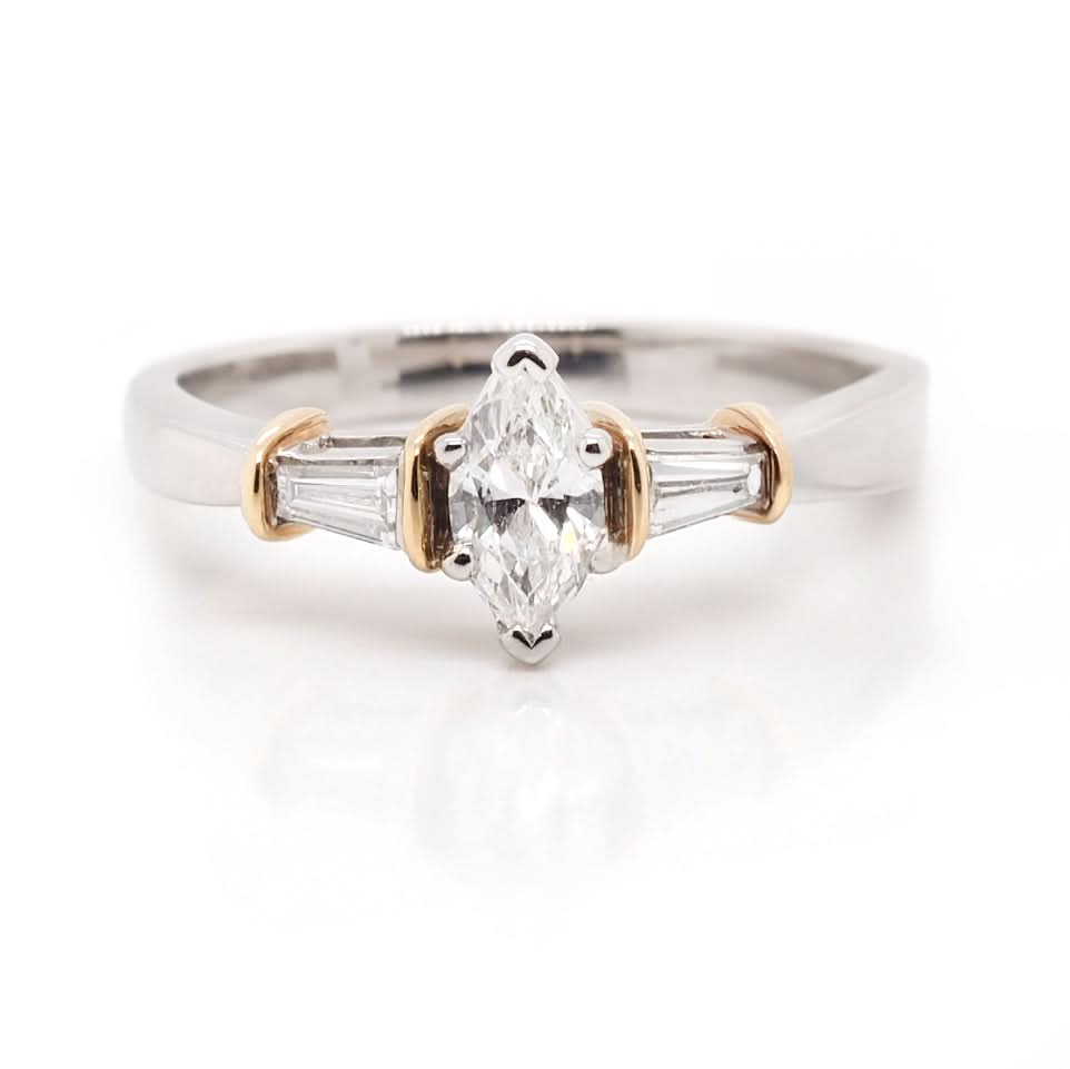 Platinum Marquise Cut Diamond Engagement Ring with Baguette Cut Diamond Set Shoulders