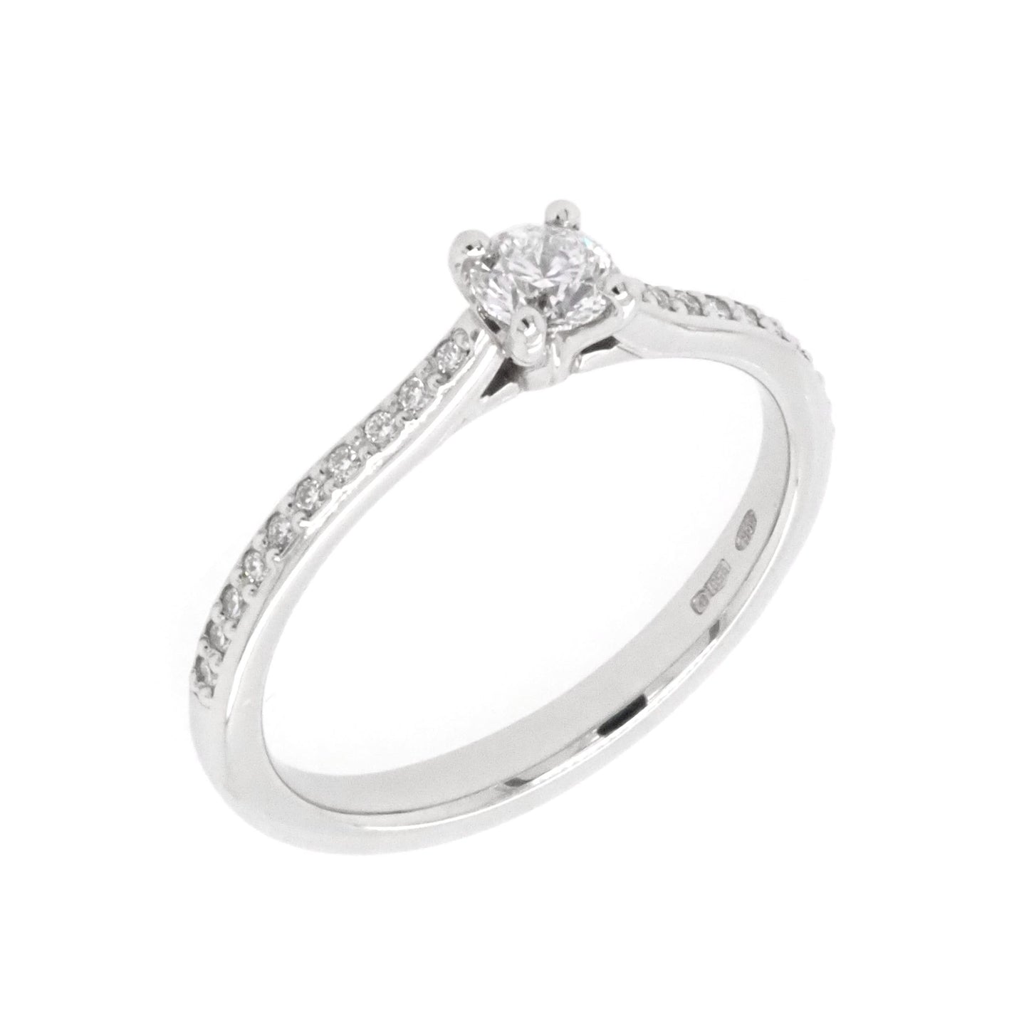 A platinum brilliant cut diamond solitaire ring with diamond set shoulders
