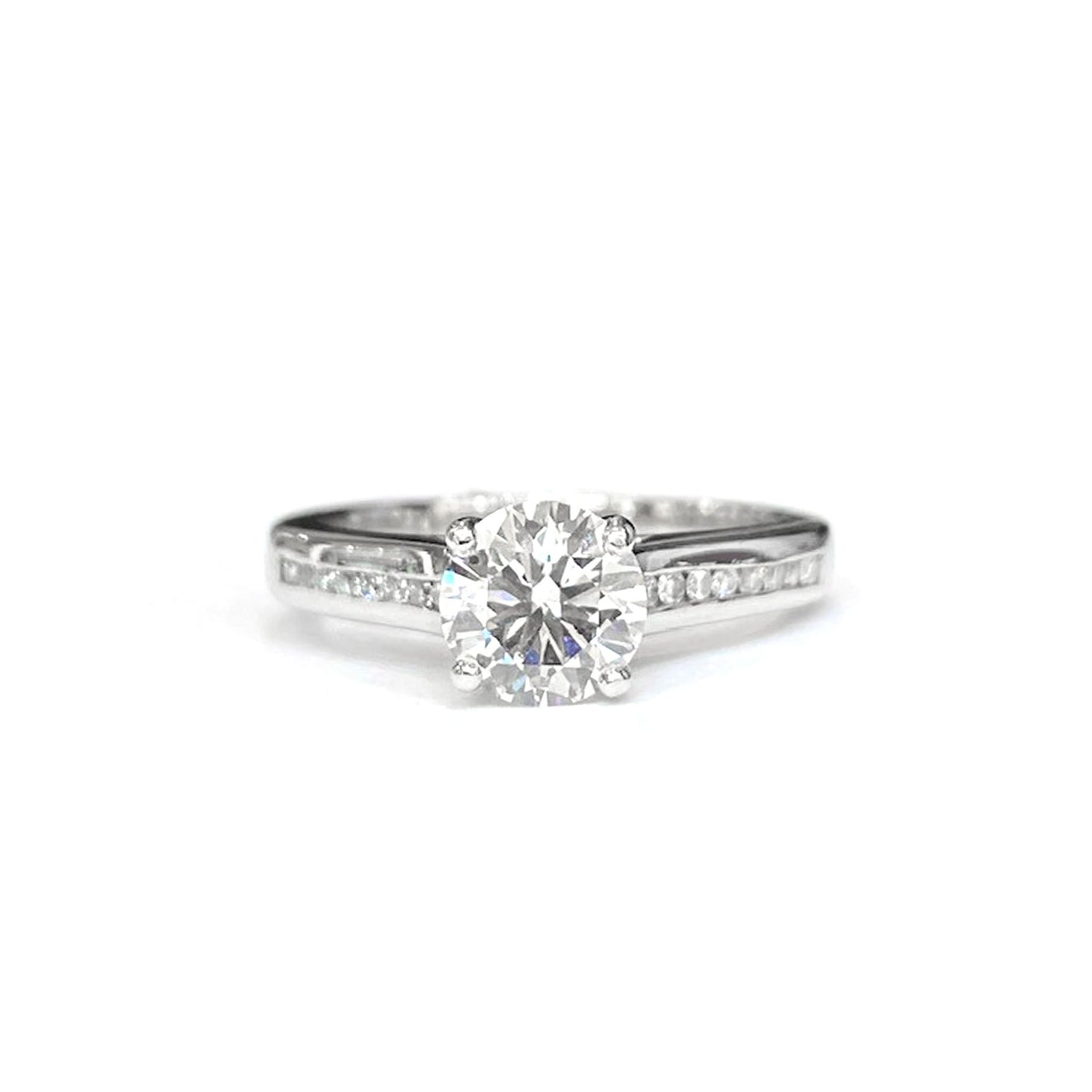 Platinum Single-Stone Diamond Solitaire Ring with Diamond-Set Shoulders
