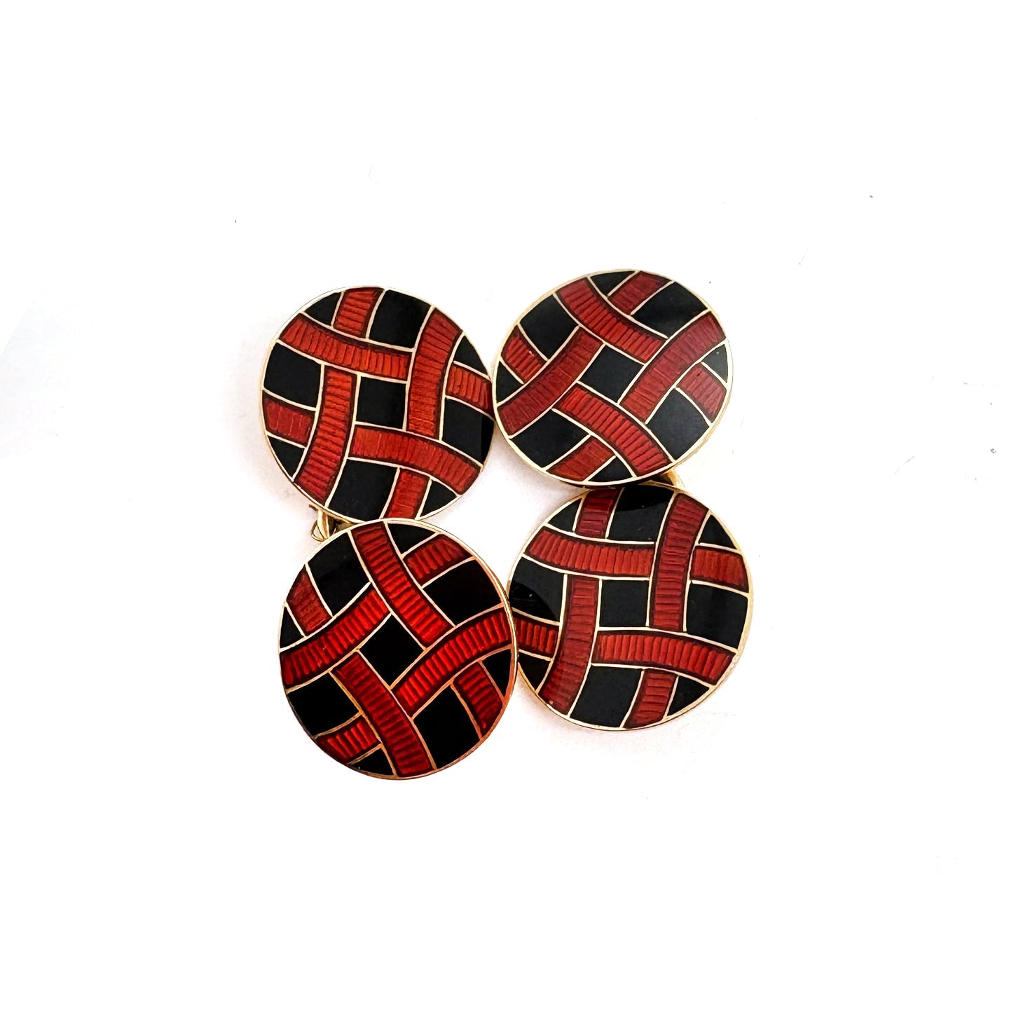 A pair of red and black enamel circular cufflinks in yellow gold