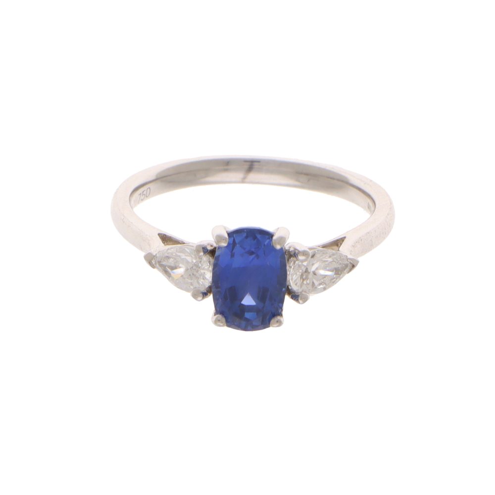 Sapphire and diamond three stone ring in white gold.