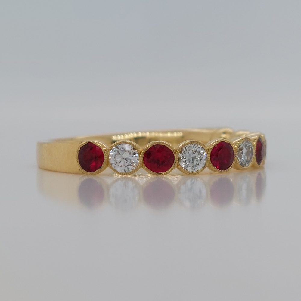 Eleven Stone Ruby and Diamond Millegrain Set Eternity Ring
