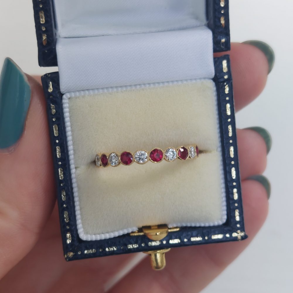 Eleven Stone Ruby and Diamond Millegrain Set Eternity Ring
