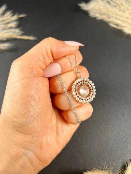 Antique 18 Carat Gold, Platinum, Moonstone, Diamond and Pearl Halo Pendant