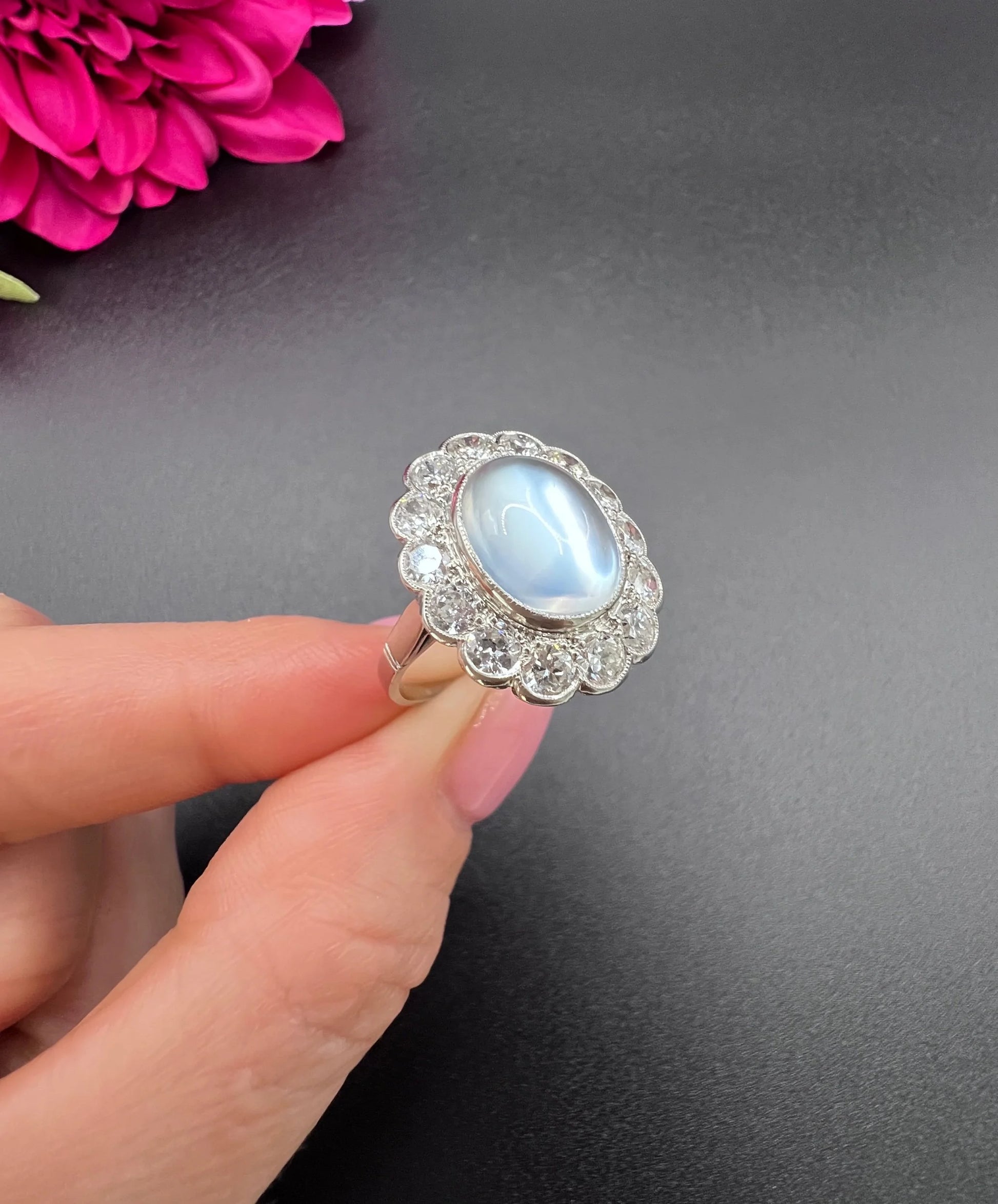 Antique French Platinum Cabochon Moonstone and Diamond Cluster Ring, Circa 1920