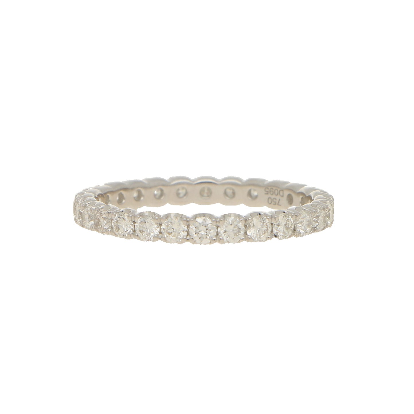 A brilliant cut diamond full eternity ring in white gold, stamped 750 D095, on a white background
