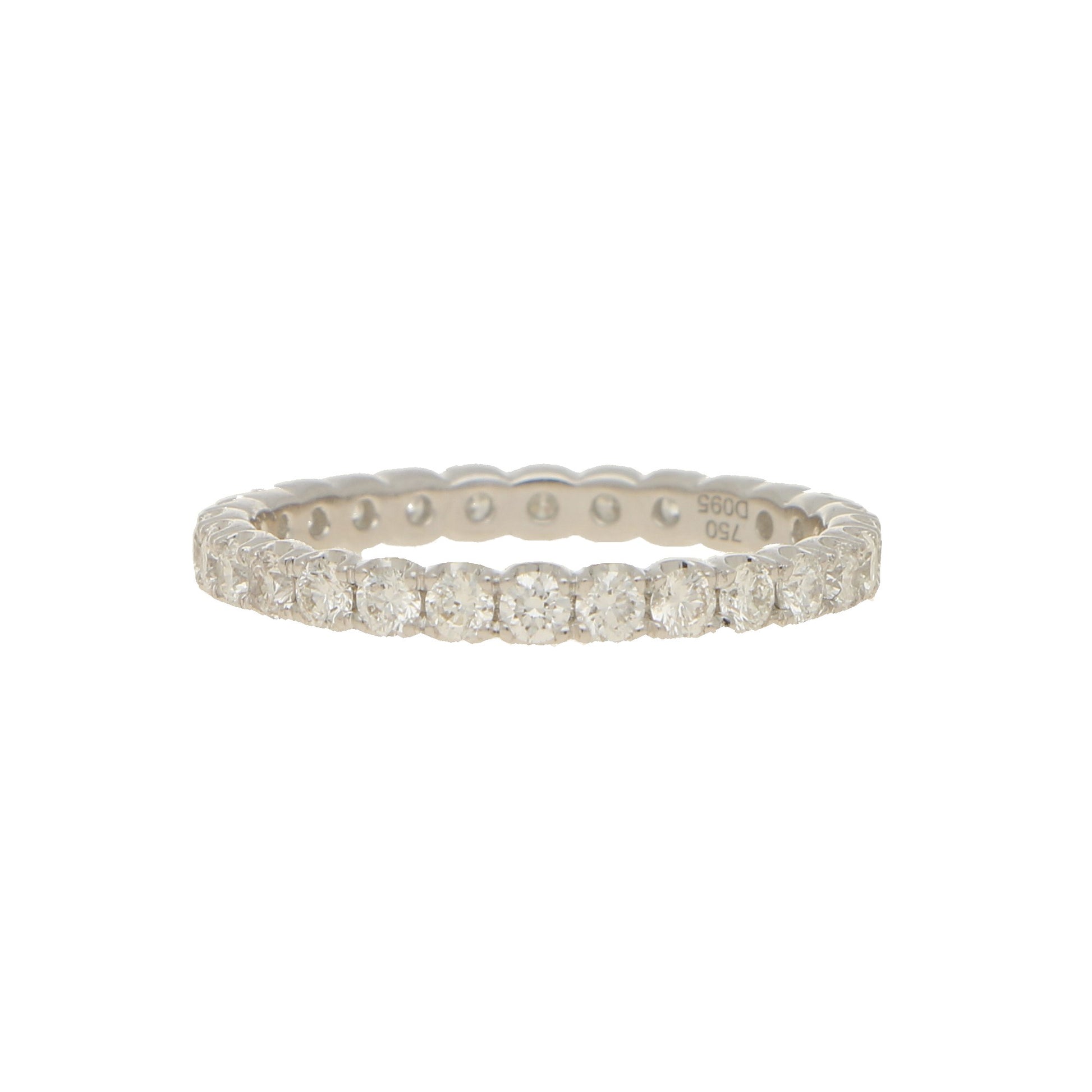 A brilliant cut diamond full eternity ring in white gold, stamped 750 D095, on a white background