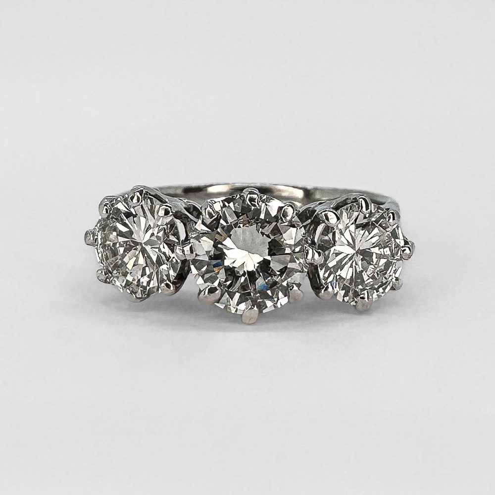 Vintage three stone diamond engagement ring