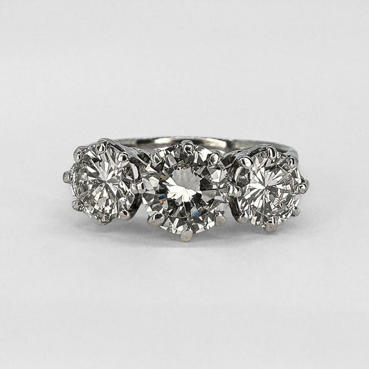 Vintage three stone diamond engagement ring