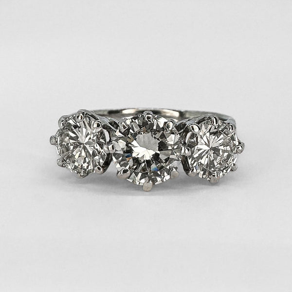 Vintage three stone diamond engagement ring