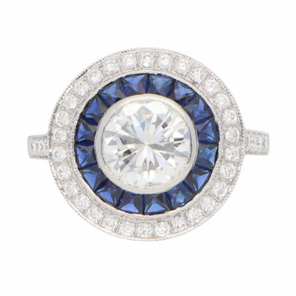 Diamond and sapphire target ring in platinum.