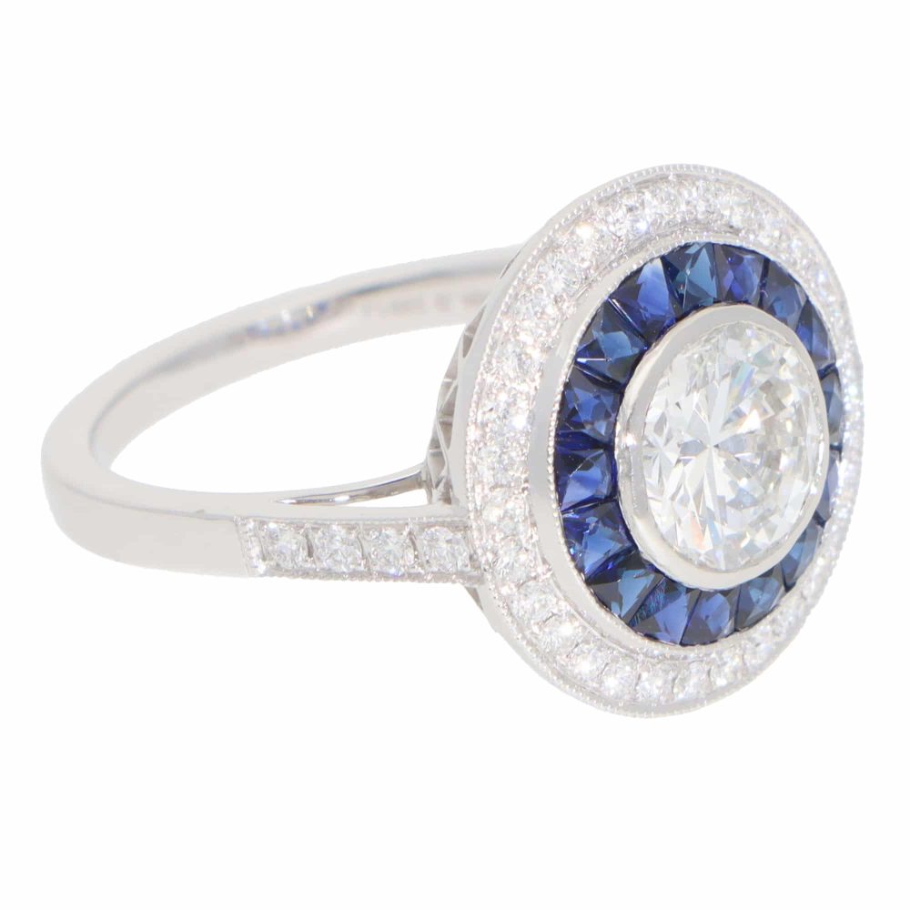 Diamond and sapphire target ring in platinum.