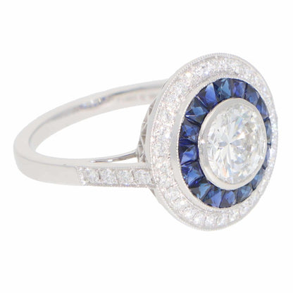 Diamond and sapphire target ring in platinum.