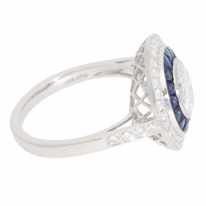 Diamond and sapphire target ring in platinum.
