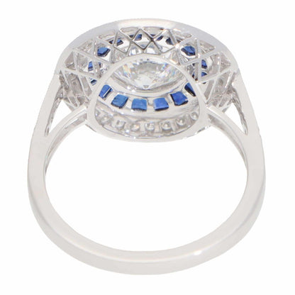 Diamond and sapphire target ring in platinum.