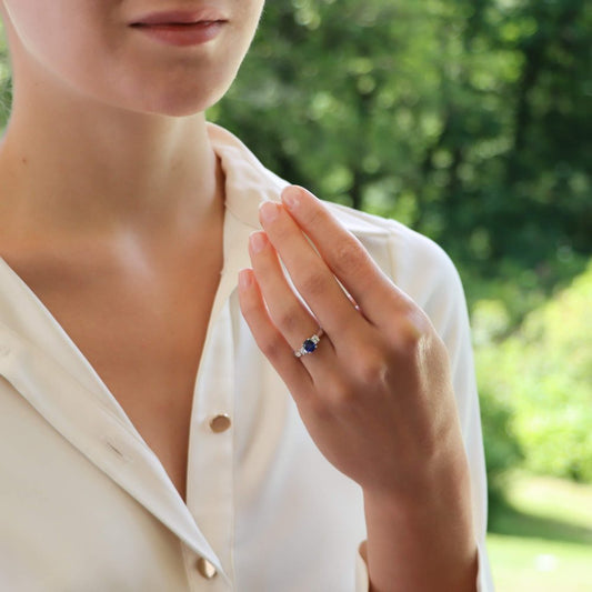0.65ct Sapphire and Diamond Three Stone Ring in Platinum