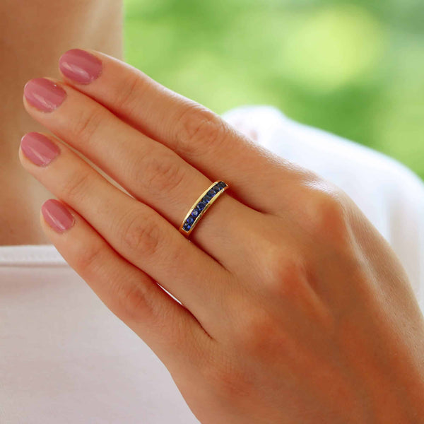Blue Sapphire Half Eternity Ring In 18 Carat Yellow Gold