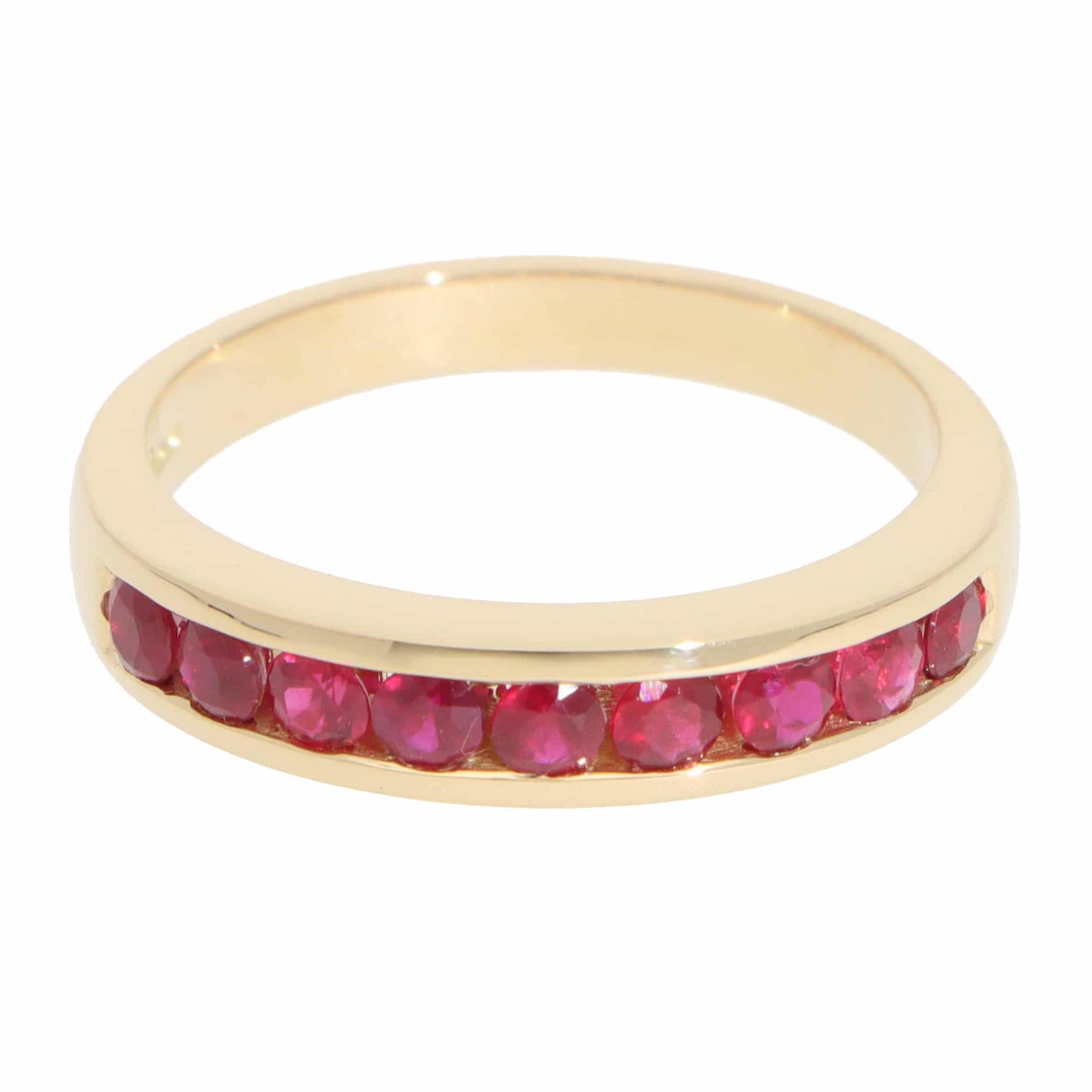 A yellow gold half eternity band with round rubies, on a white background