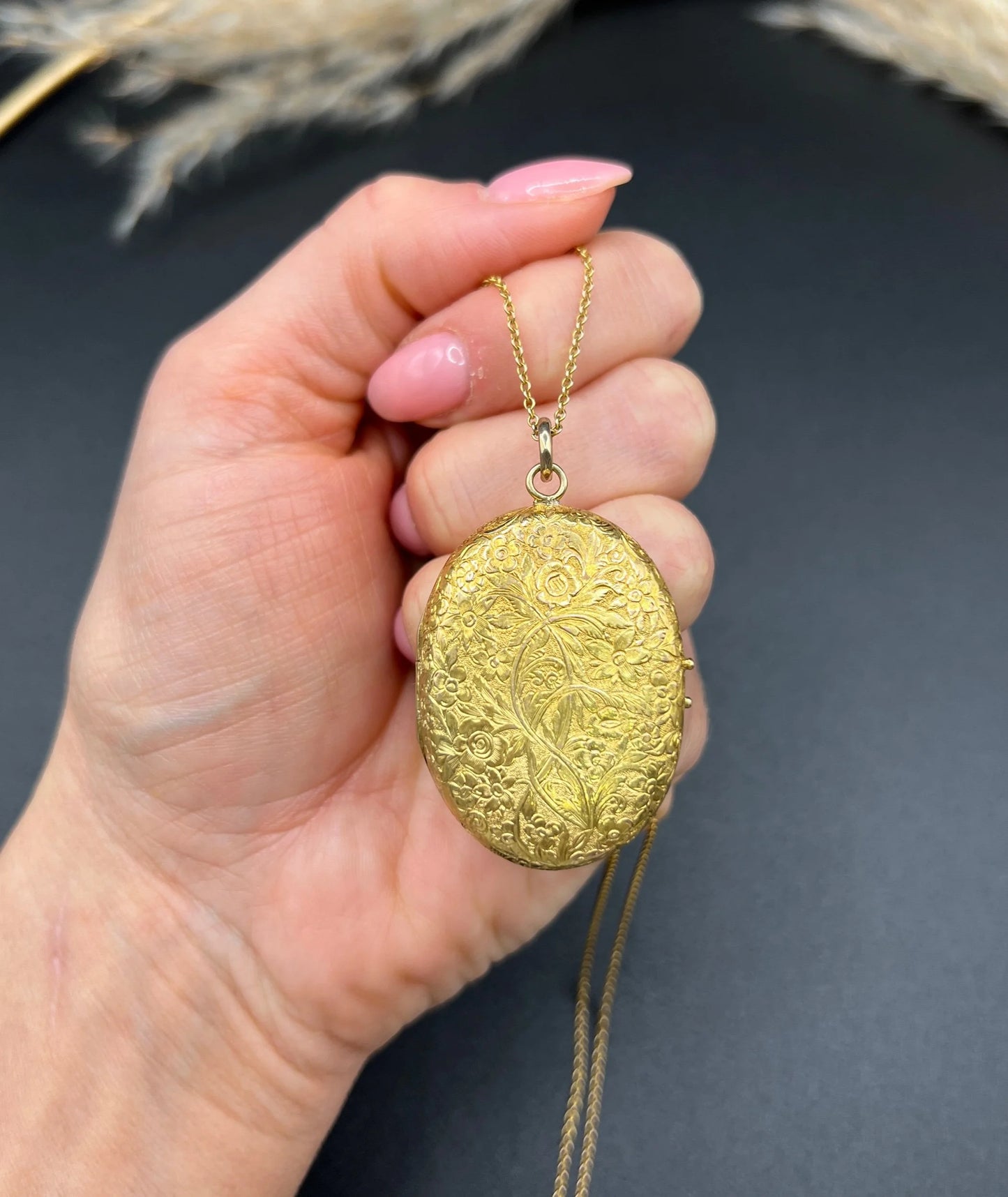 Victorian 18 Carat Yellow Gold Floral Engraved Oval Shaped Locket, Circa 1880