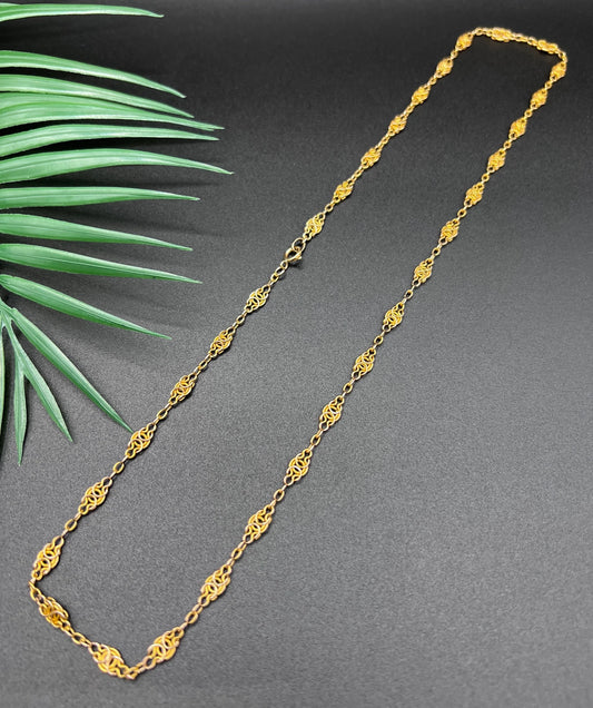 A yellow gold fancy link chain necklace