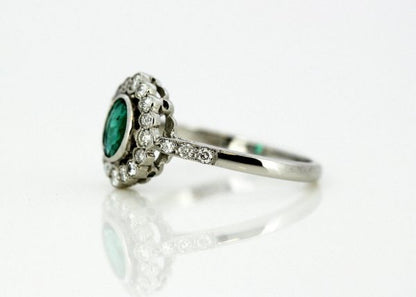 Vintage Oval Cut Emerald and Diamond Cluster Ring, 18ct White Gold