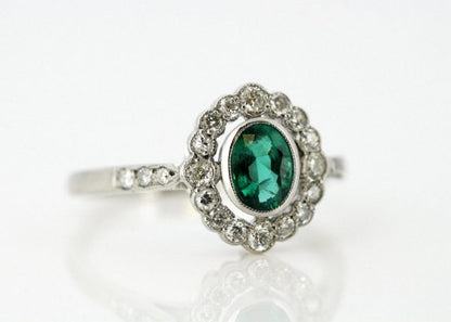 Vintage Oval Cut Emerald and Diamond Cluster Ring, 18ct White Gold