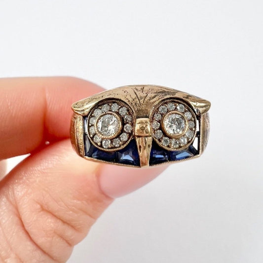 Vintage owl cocktail ring in rose gold with diamonds and sapphires.