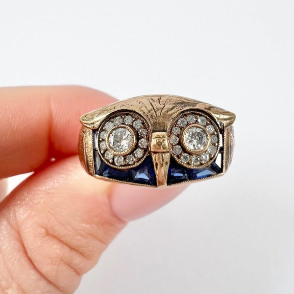 Vintage owl cocktail ring in rose gold with diamonds and sapphires.