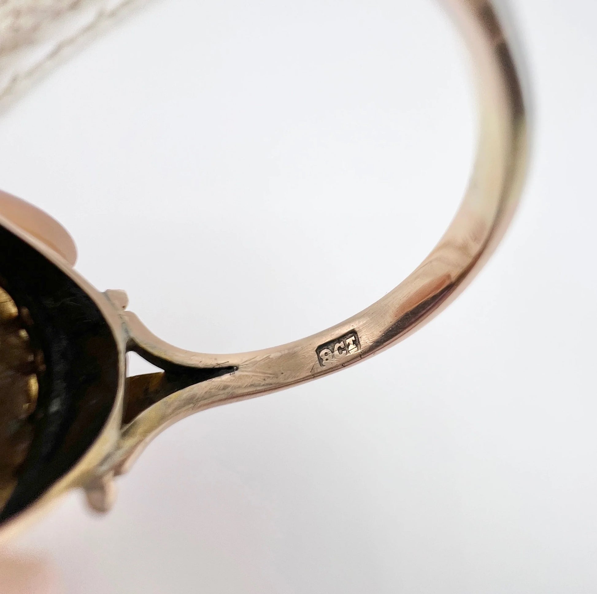 A 9CT stamp inside a yellow gold ring shank