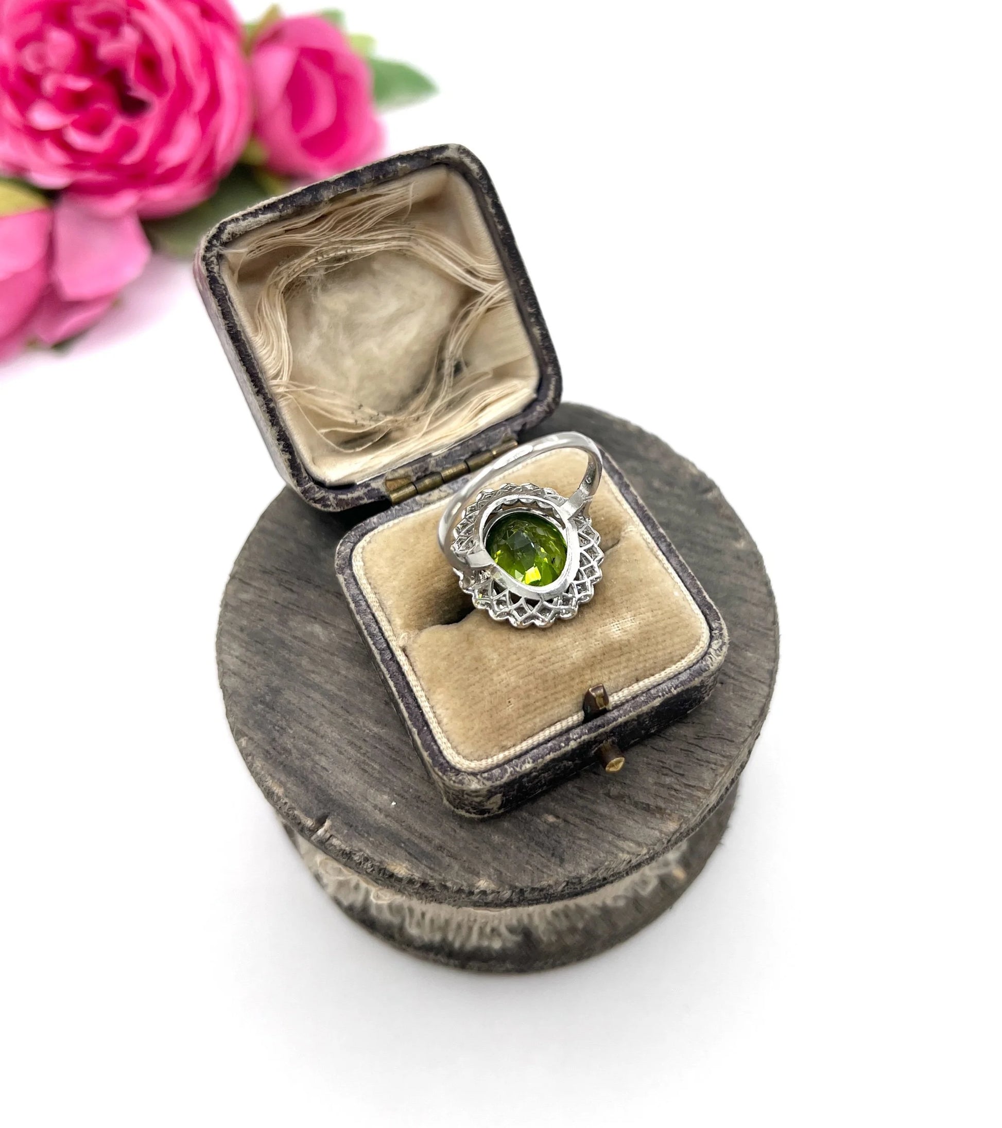 Antique French Platinum Peridot and Diamond Halo Cluster Ring, Circa 1910