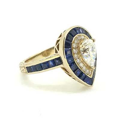 1ct Pear Cut Diamond and Sapphire Target Cluster Engagement Ring