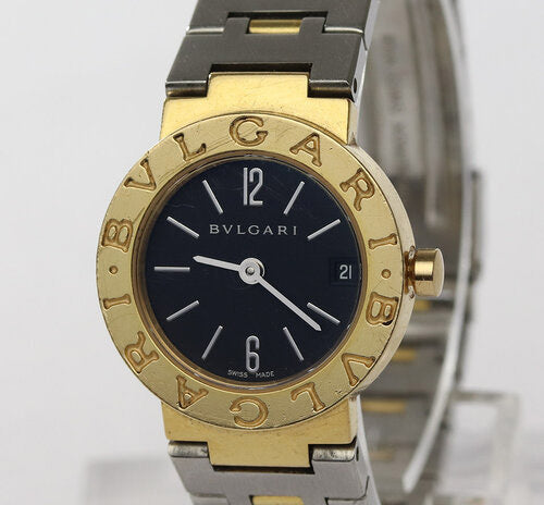 Bvlgari Ladies 18ct Yellow Gold and Steel 23mm Quartz Watch; black dial, date indicator and sapphire crystal, on Steel and gold bracelet with fold over clasp