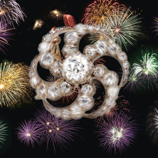 Antique Edwardian 2.60ct Old Cut Diamond Catherine Wheel Brooch Pendant; central 1.20ct old cut diamond surrounded by six graduated diamond-set spokes, in silver and gold