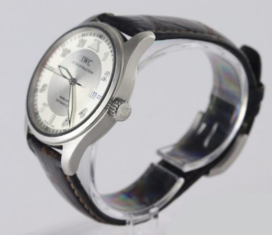 IWC Mark XVI 39mm Automatic Stainless Steel 39mm Watch; silver dial with white surround, date indicator, screwdown crown, luminescent hands and sapphire crystal. On an IWC brown leather strap with steel pin buckle. With IWC Box