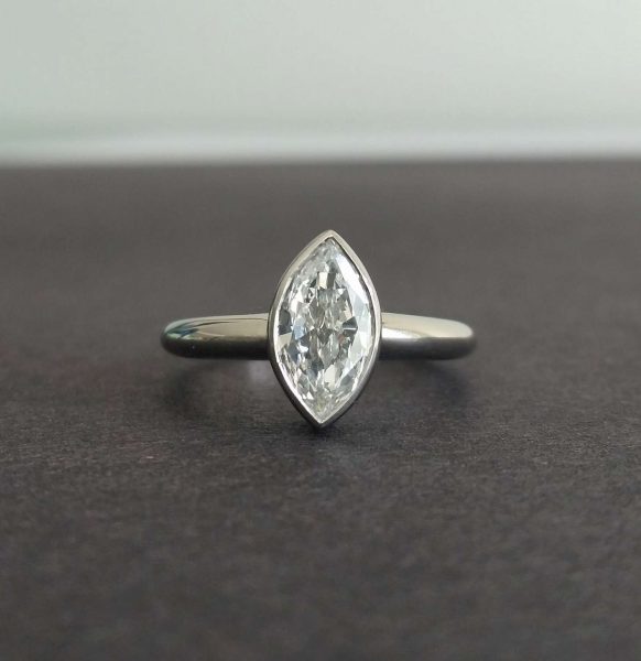 Vintage 1.00ct Marquise Cut Diamond Solitaire Ring, mounted in a new simple rub over platinum setting, colour D, clarity VS2, unique engagement ring