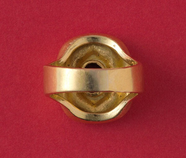 Art Deco Hammered Gold Ring with Ruby; hammered gold anthroposophical ring set with a 1.40ct oval natural untreated bright red Cambodian ruby, from the Steiner workshops during Karl Mohr’s supervision