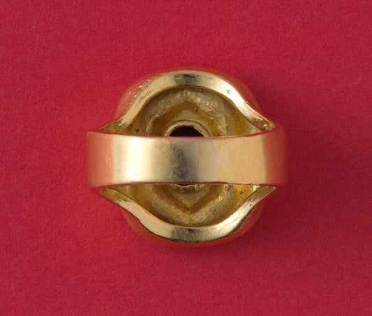 Art Deco Hammered Gold Ring with Ruby; hammered gold anthroposophical ring set with a 1.40ct oval natural untreated bright red Cambodian ruby, from the Steiner workshops during Karl Mohr’s supervision