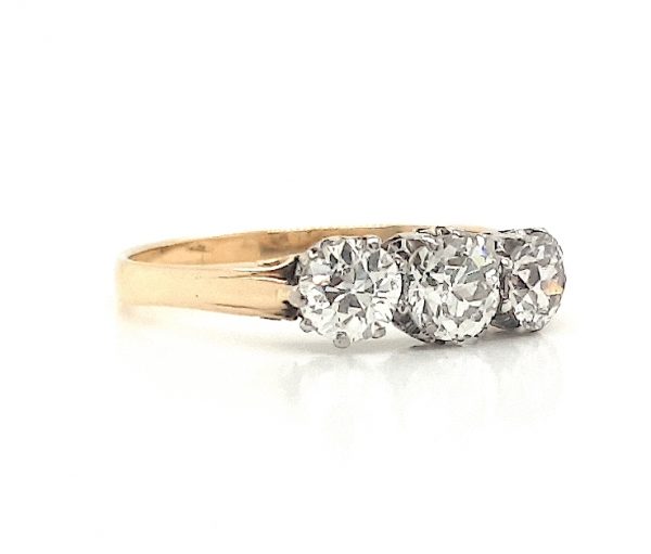 Antique Victorian Old Cut Diamond Three Stone Ring, 1.60 carat total, in 18ct yellow gold. English, 19th century, Circa 1880